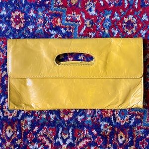 Hobo Mustard yellow distressed clutch
